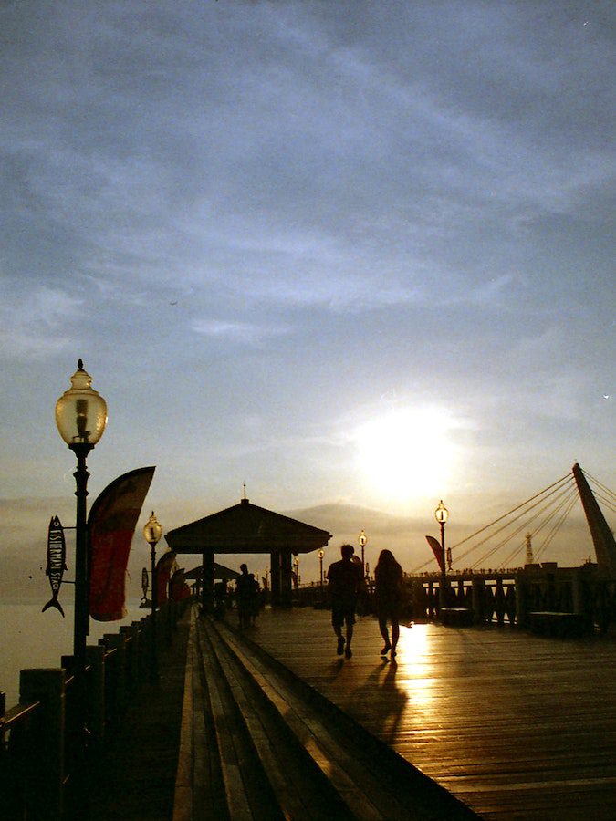 People on the Boardwalk at Sunset People on the Boardwalk at Sunset